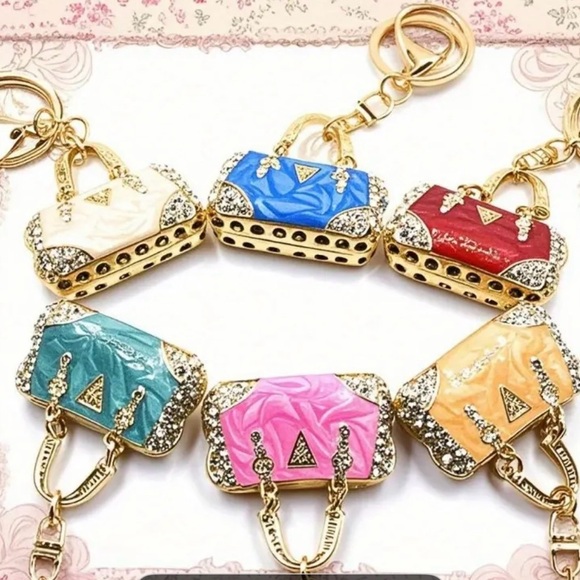 Bag Charm/Keyring NIP Six colors to choose from. NWT - Picture 1 of 3